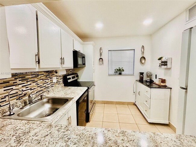 Building Photo - 8350 Sands Point Blvd