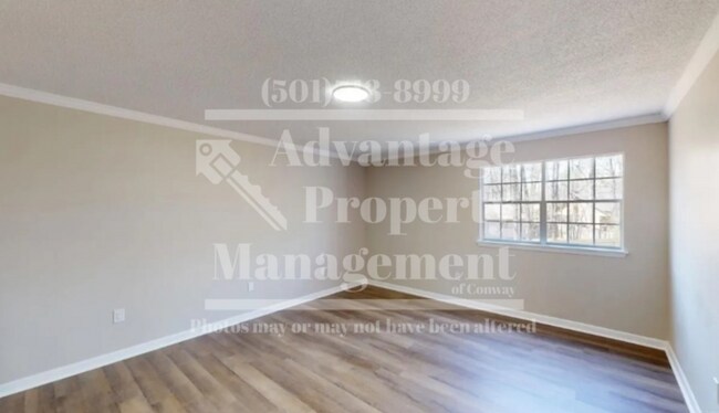 Building Photo - Showings Available!
