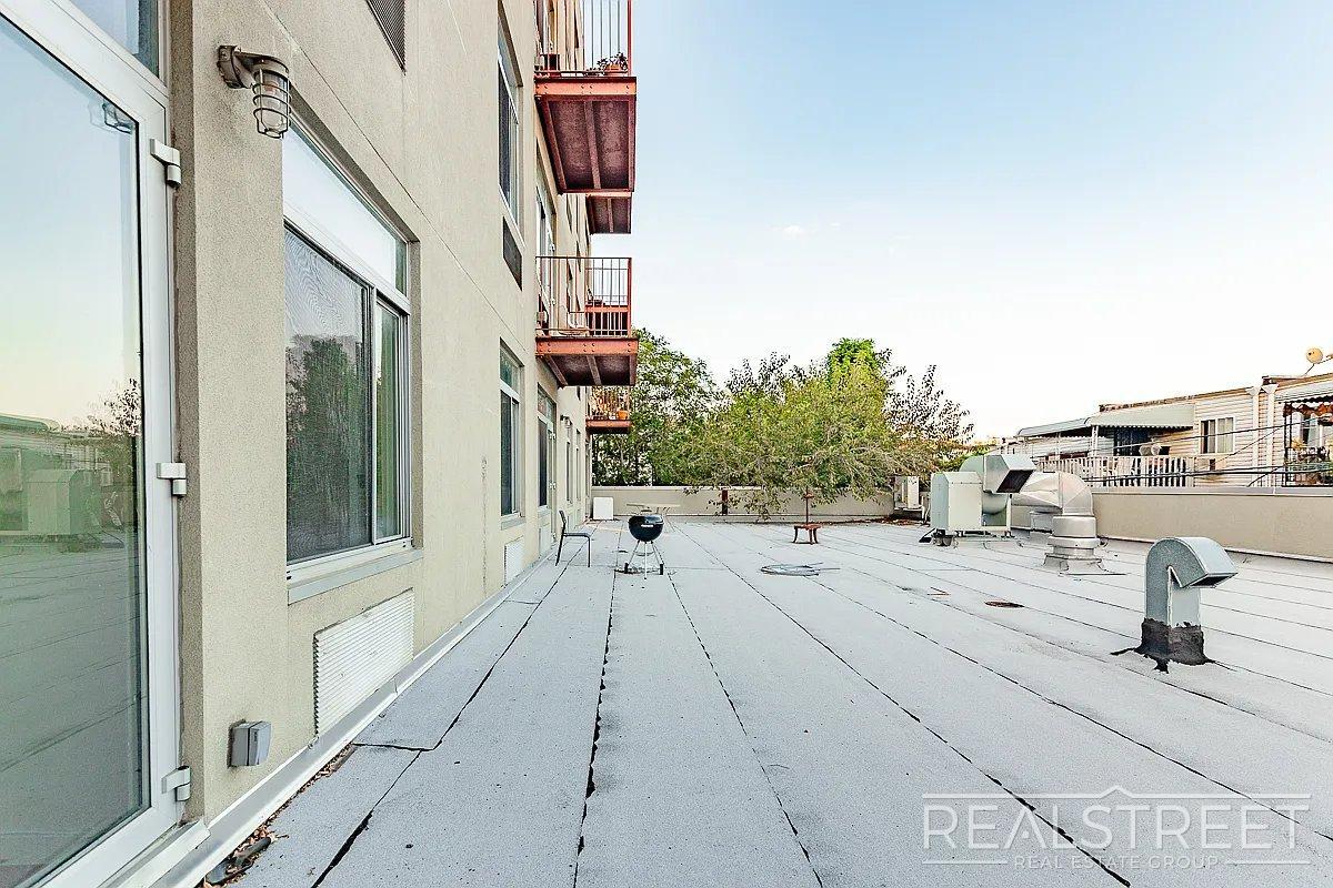 Building Photo - Massive Outdoor Patio | Spacious 3BR/2BA Apartment in Bushwick–East Williamsburg