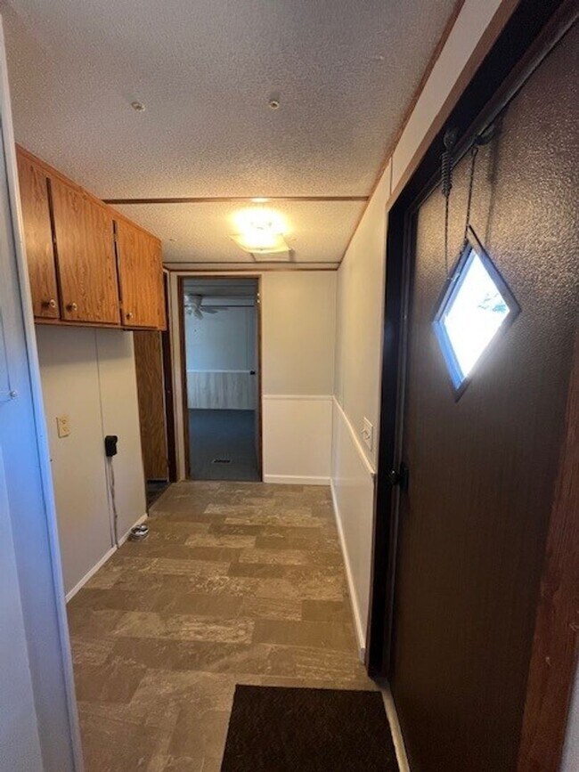 Building Photo - Welcome to this charming 2-bedroom, 1.5-bathroom home located in the desirable area of Leland, NC