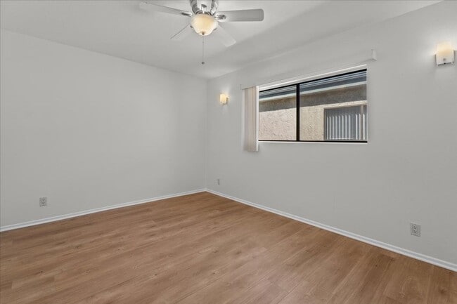 Building Photo - Light Filled Townhome Style Condo with Private Patios and Direct Access