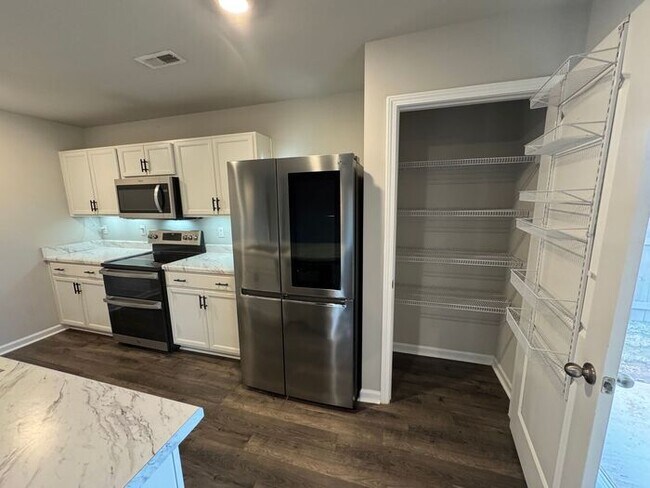 Building Photo - Make This Your HOME with a FENCED YARD