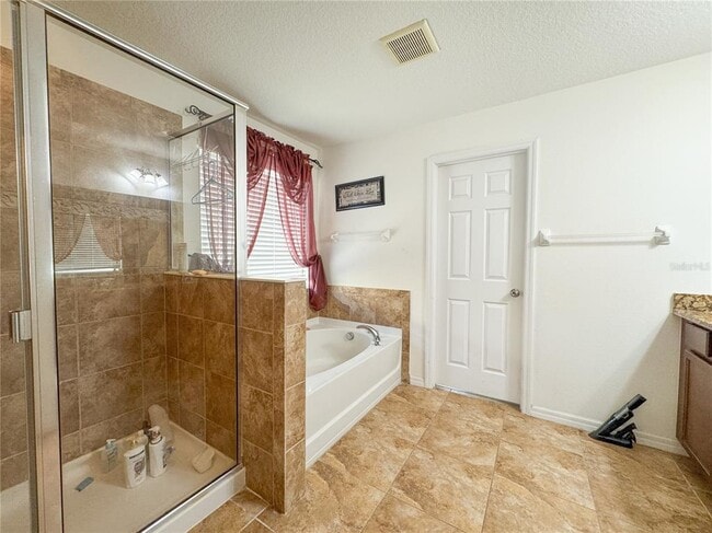 Building Photo - 5594 Angelonia Terrace