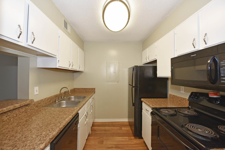 Sleek Galley Kitchen - Croley Court