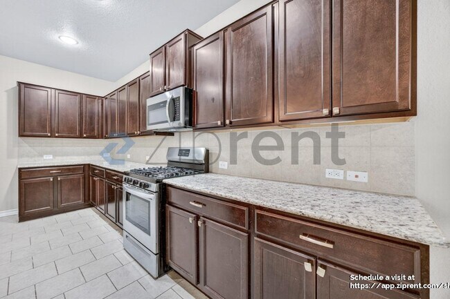 Building Photo - 8745 Ironwood Hill