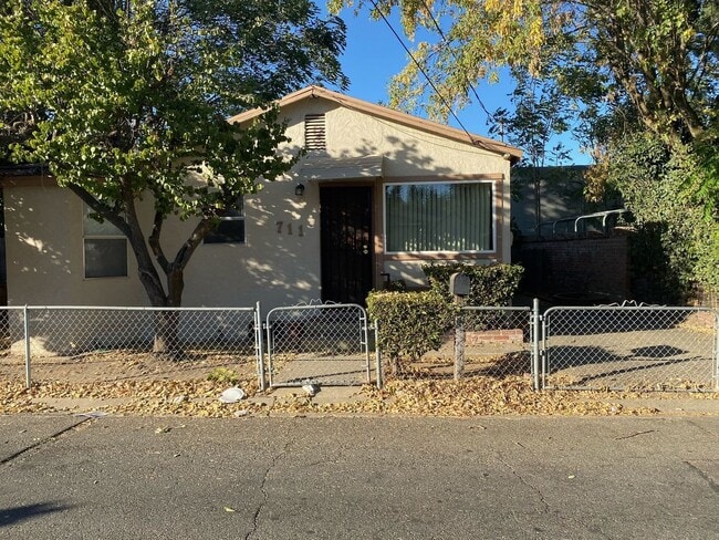 Primary Photo - Cozy 1-Bedroom Home with Fenced Yard Near ...