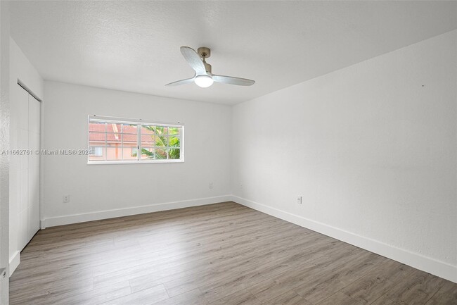 Building Photo - 9837 W Okeechobee Rd