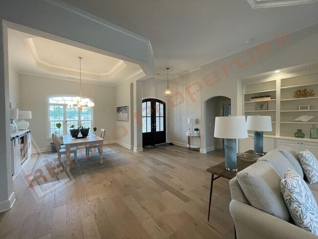 Building Photo - Stunning 4-Bedroom, 4.5-Bath Home with Pri...