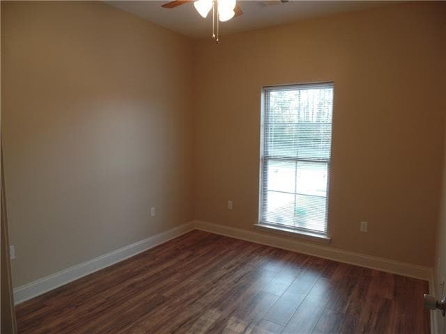 Bedroom 2 , ceiling fans, hardwood floors - 221 Bella Sera Ln