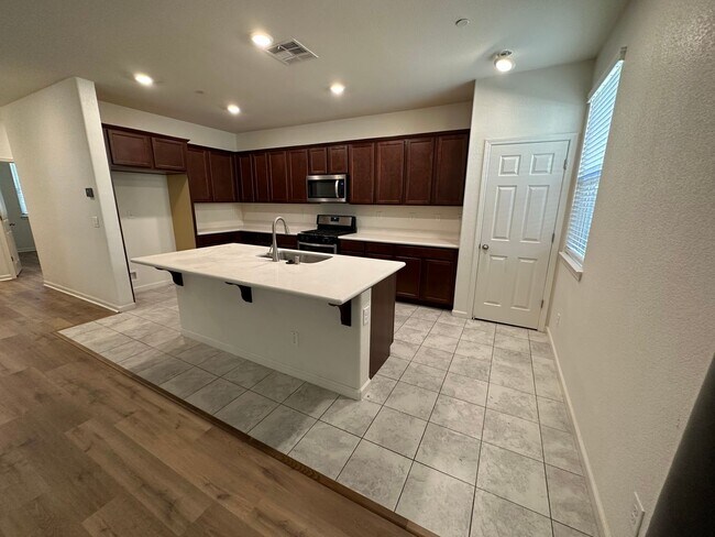 Building Photo - Stunning 4 Bedroom, 3 Bath Gated Community W/ Solar