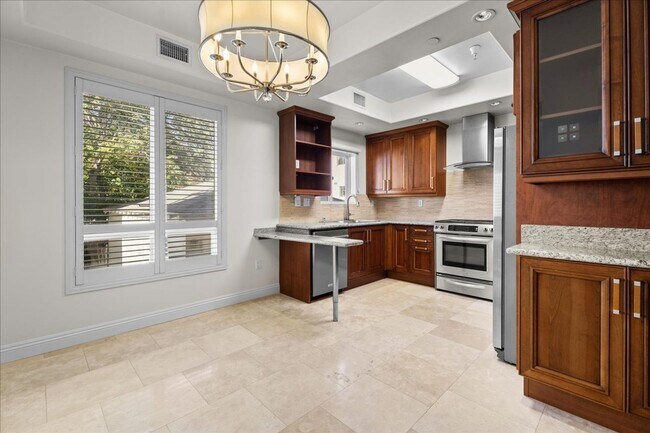Building Photo - Spacious 3-Bedroom Tri-Level Townhome with...