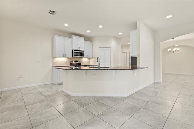 Building Photo - 12133 SW Aventino Dr