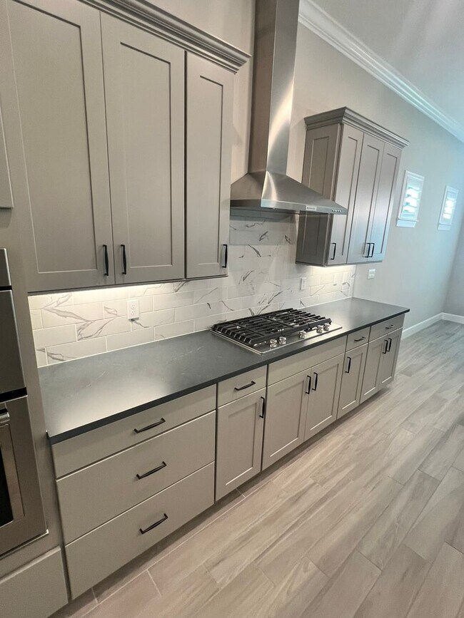 Building Photo - STUNNING LAKEFRONT 3 BEDROOM, 2.5 BATH HOM...