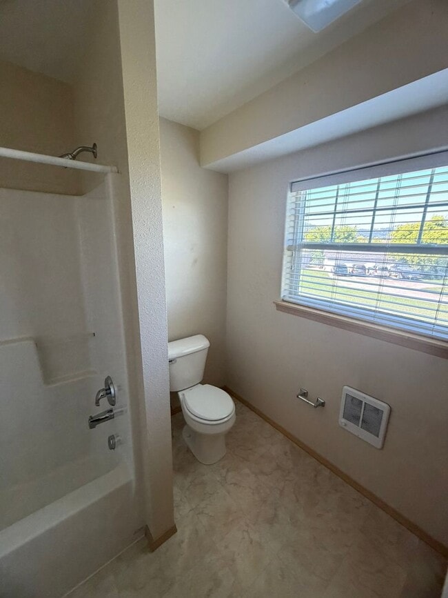 Building Photo - Charming 2-Story Townhome with Vaulted Ceilings