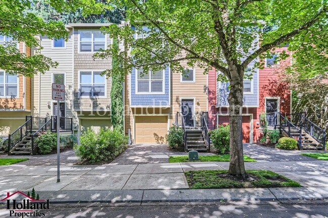 Building Photo - Stylish 3-Level Townhome Surrounded by Nat...