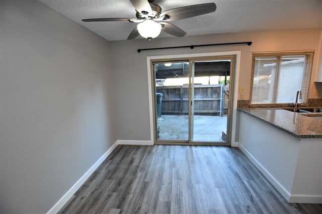Building Photo - 8744 Woodman Way