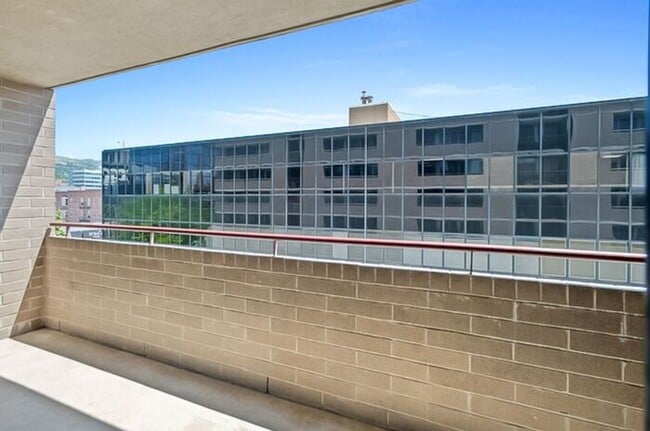 Building Photo - 2BR Condo w/ Covered Parking and Balcony Views at Broadway Towers