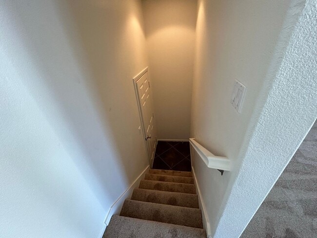 Building Photo - Spacious 3-Bedroom, 2.5-Bath Condo for Ren...
