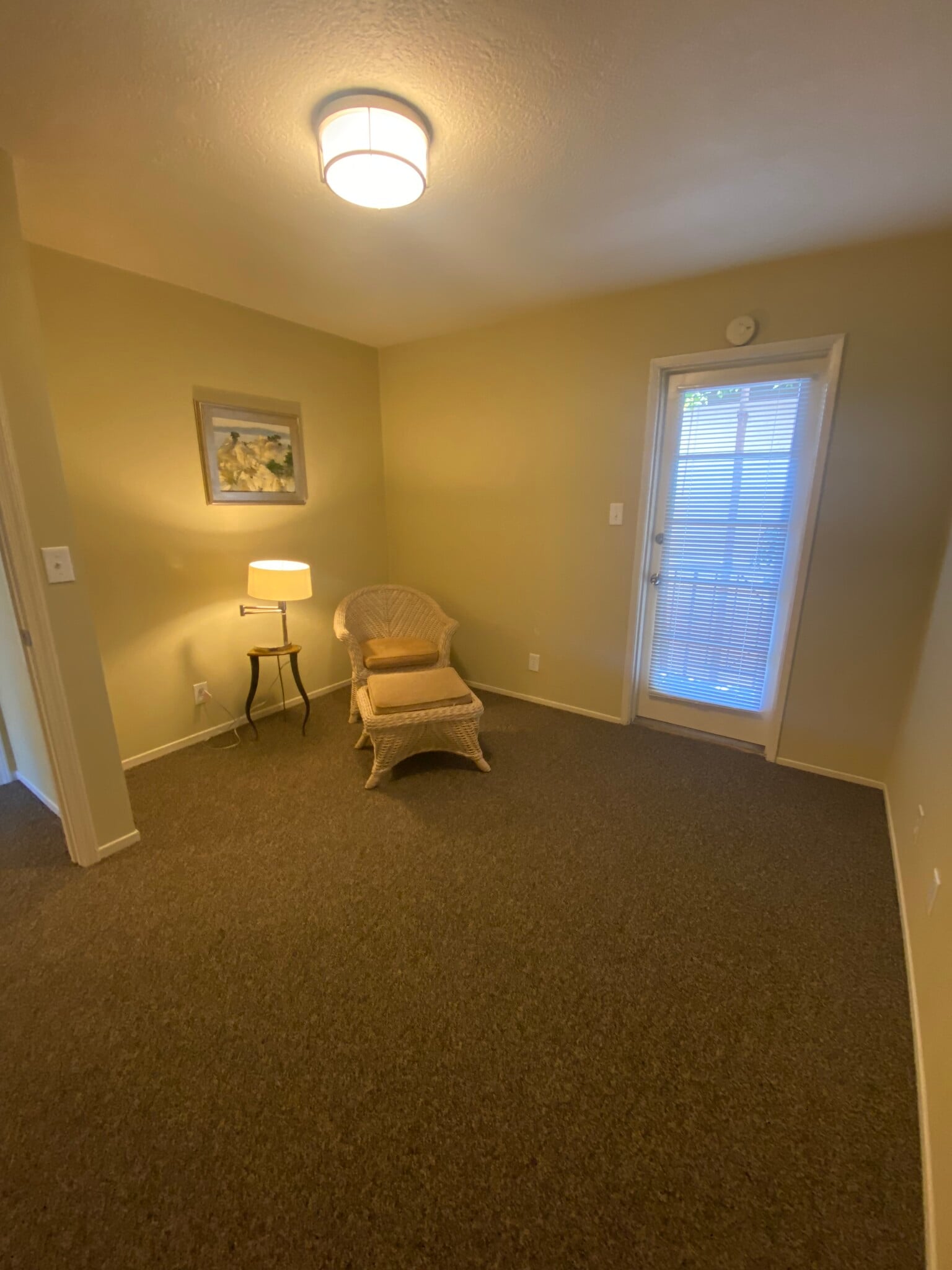 First bedroom with large closet and access to private deck - 3833 Maybelle Ave