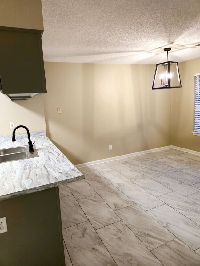 Building Photo - Now Available – Beautifully Renovated 2 Bed, 2 Bath Townhome!