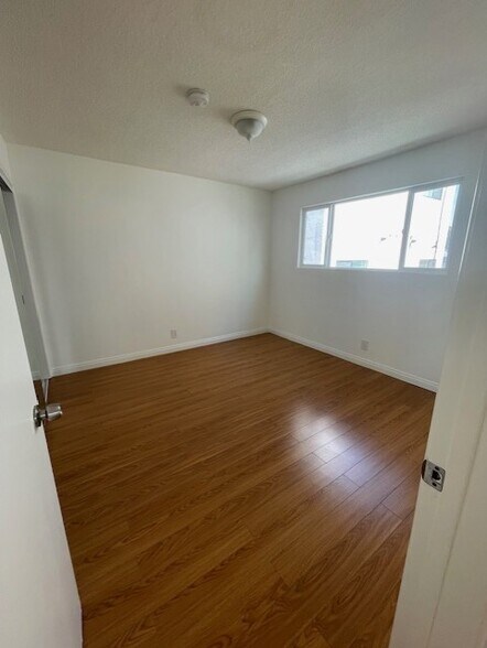 2nd Bedroom with large window - 5462 Barton Ave