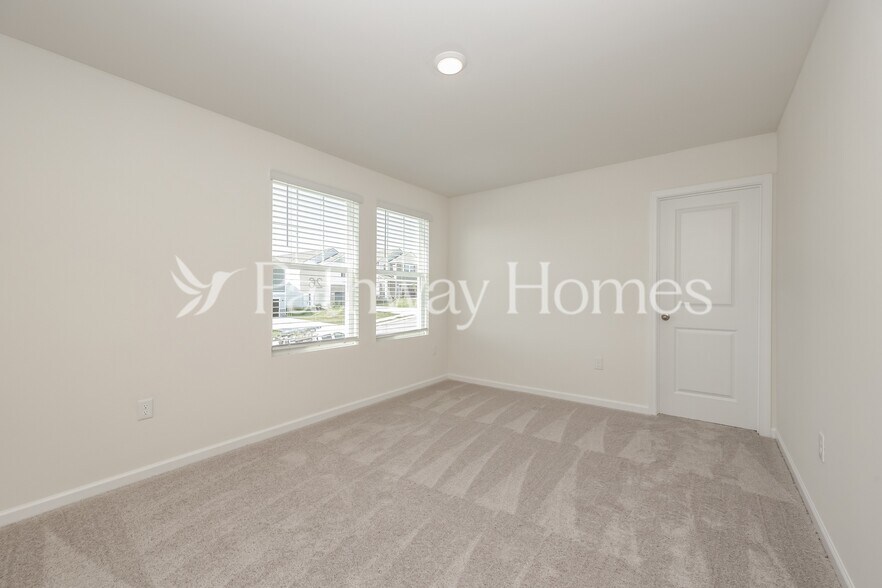 Building Photo - 202 Wild Daisy Wy