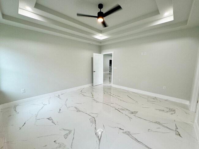 Building Photo - LOOK AT THIS ONE! BEAUTIFUL home with a pond view right outside the back patio!