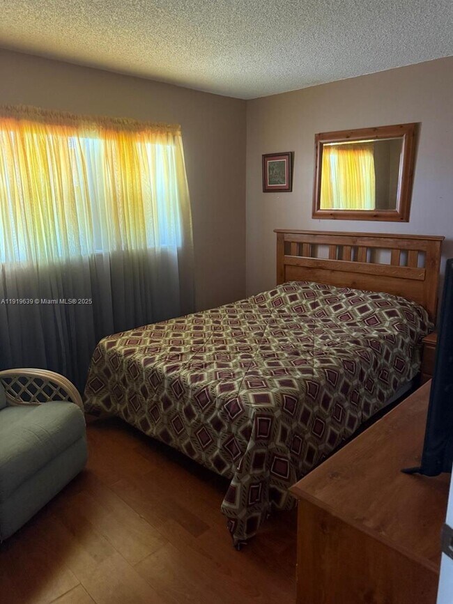 Building Photo - 8220 Sunrise Lakes Blvd