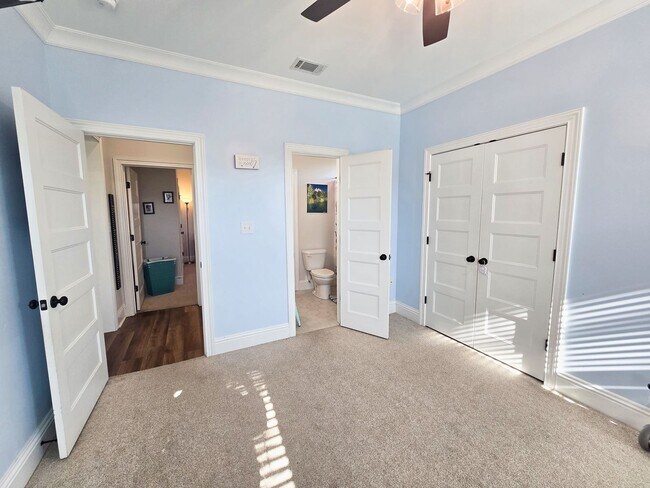 Building Photo - Spacious 4BR/3BA Home with Open Floor Plan, Screened Porch & Fenced Backyard