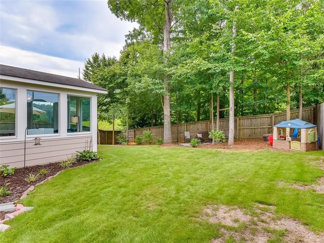 Fully Fenced in backyard backing up to walking trails - 2180 Collins Ridge Dr NW