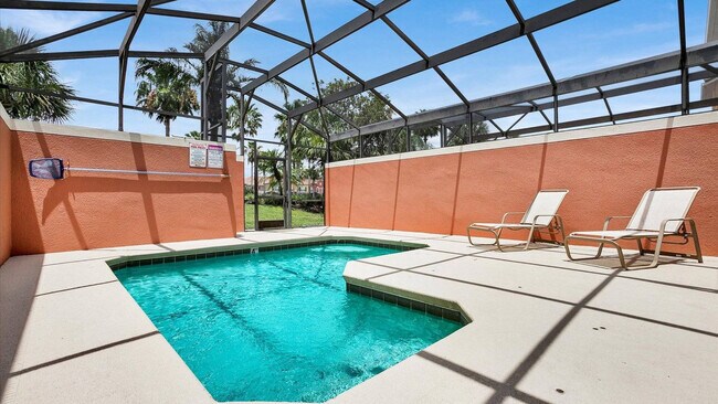 Building Photo - 8975 Majesty Palm Rd