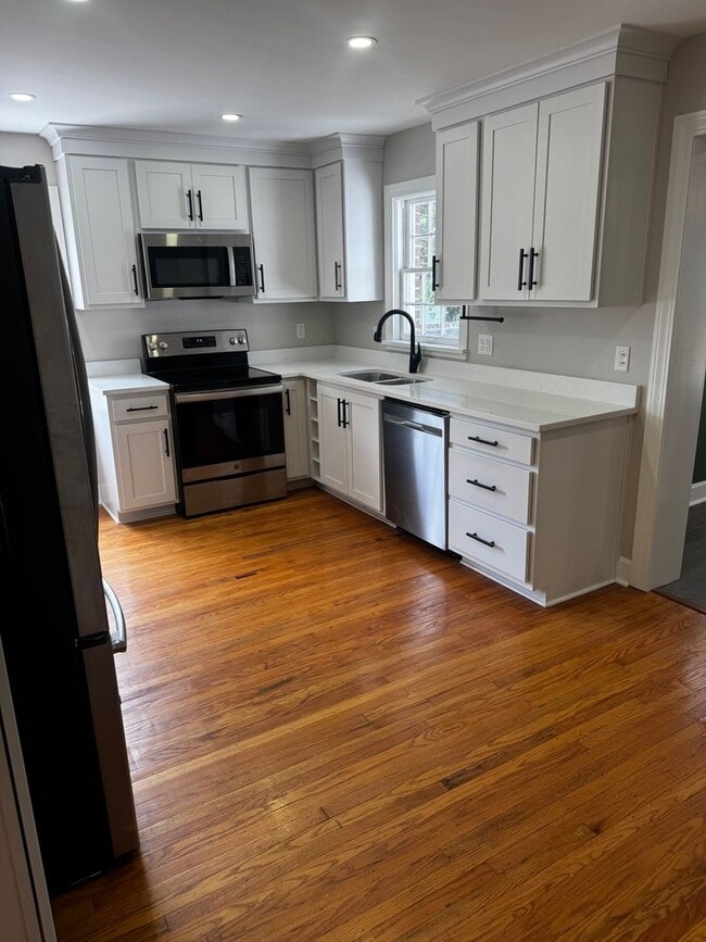Building Photo - Fully Updated 3BR/2BA St. Matthews Cape Cod with Garage & Wrap-Around Deck