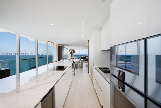 Building Photo - 10203 Collins Ave