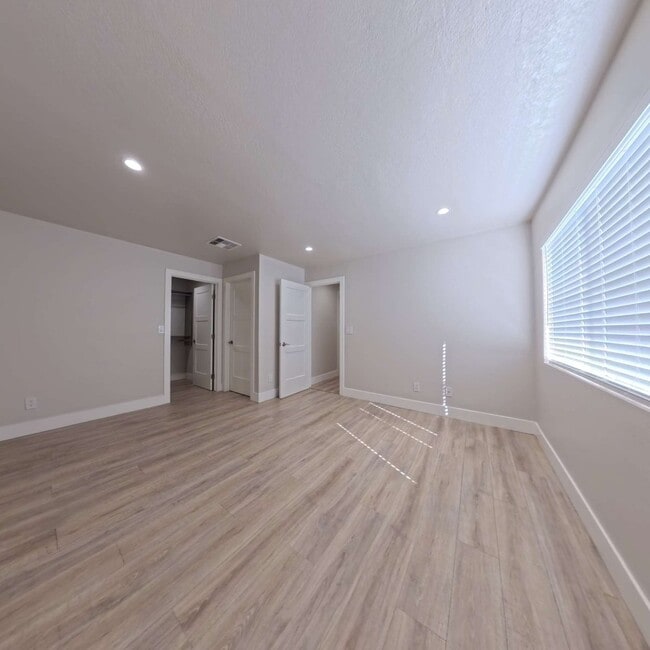 Building Photo - Highly Remodeled | Customer Closets | Gated Community
