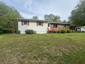 Building Photo - ½ Off First Full Month with Move-In by 8/15 • Large Yard & Deck • August App Fee Only $32. Pet-fr...