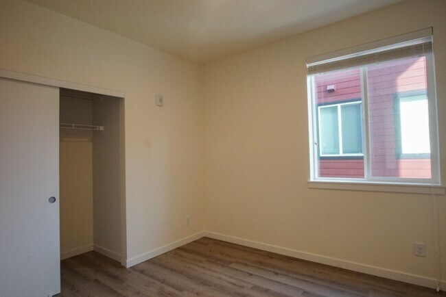 Building Photo - Modern & Chic Corner 1-Bed w/Private Balcony!