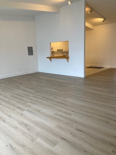 Living room toward kitchen - 231 Lake Ave