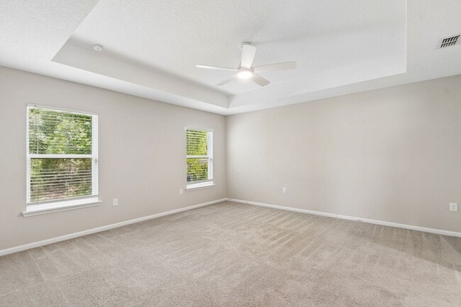 Building Photo - Modern 4BR Home with 3 Full Baths in River Glen | Screened Porch & Resort-Style Amenities