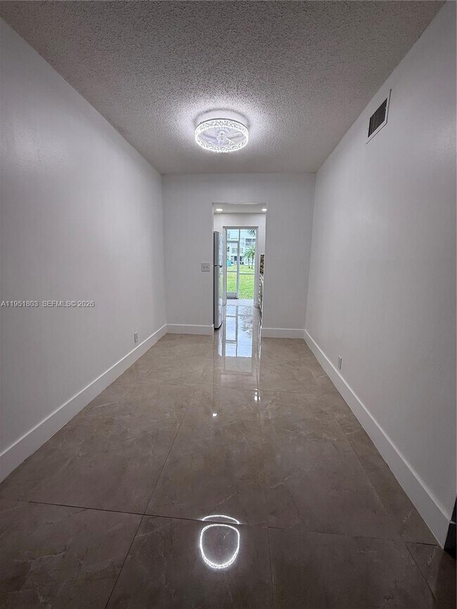 Building Photo - 6650 Royal Palm Blvd