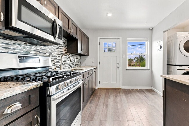 Building Photo - $2,020.95, 2 Beds - 2 Bath, Duplex in Denver with Washer and Dryer!