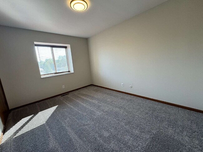Building Photo - Up Where We Belong — Spacious 2-Story Townhome with Basement