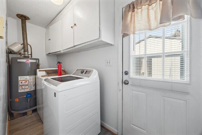 Building Photo - Classic Brick Ranch with 24x24 Workshop, Fenced Yard & Garden Beds