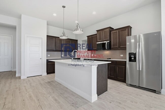 Building Photo - Thoughtfully Designed 4 Bed Home with Elevated Interiors and Lake Views