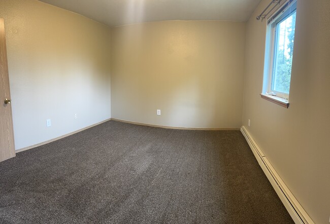 Bedroom # 2 Versatile bedroom space perfect for a guest room, home office, or cozy retreat. - 2979 Badger Rd