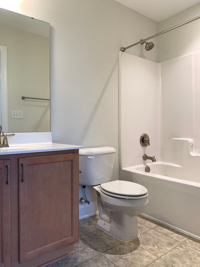 Building Photo - PRIME LOCATION, 3 Bedrooms Suites Apex TH Near HWY, Schools, Shops and Community Amenities!