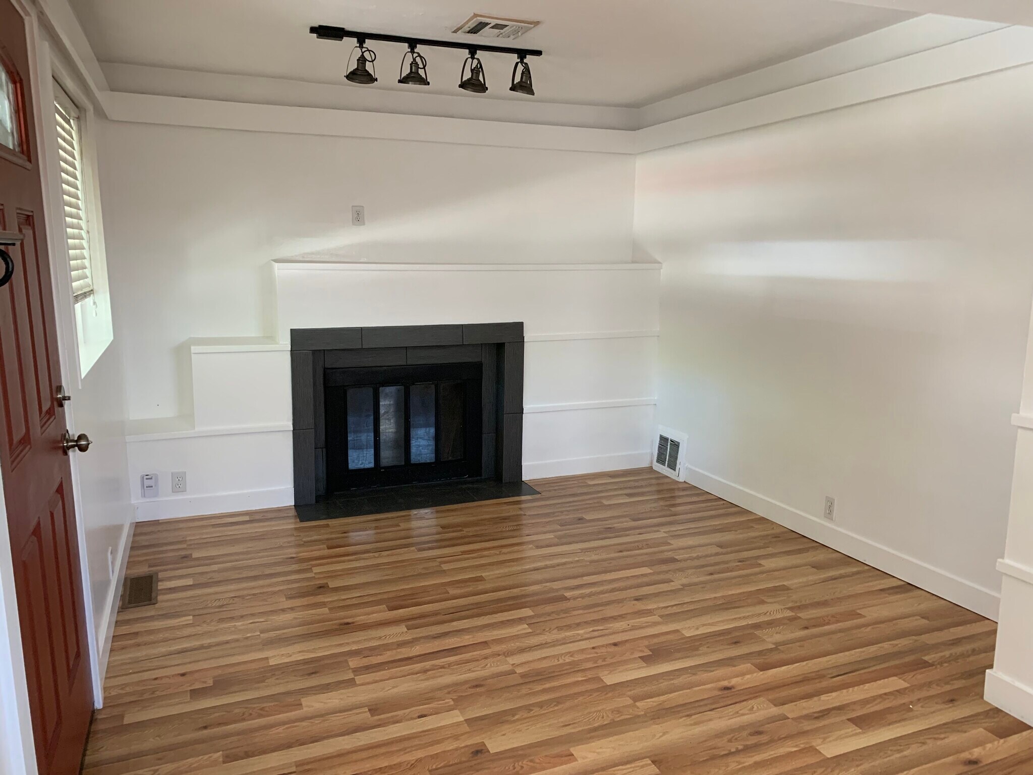 Living room with cozy fireplace. - 544 Wilmington Ave