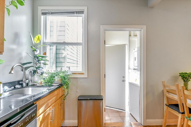 Building Photo - Epic REA - Modern 2 BR/1 BA Condo w/Privat...
