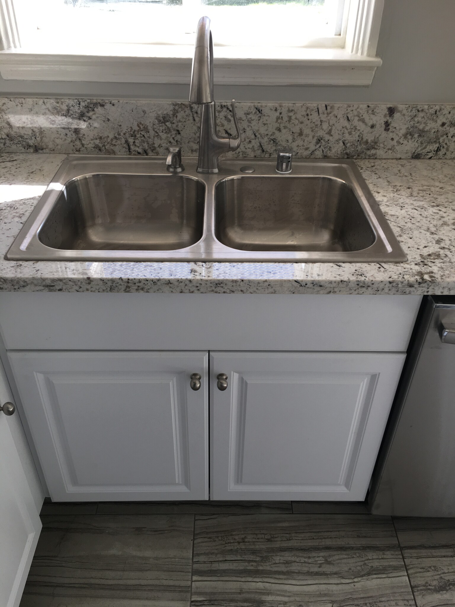 dual sinks with disposal and designer faucet - 4950 Chimineas Ave