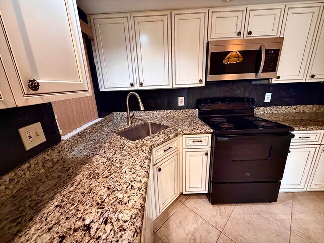 Building Photo - 8657 Boca Glades Blvd W