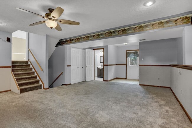 Building Photo - Spacious 4-Level Home with Deck, Workshop ...